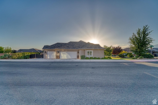 3207 W 2650 S, Hurricane, UT 84737 - ranch-style house featuring an attached garage, stucco siding, and driveway
