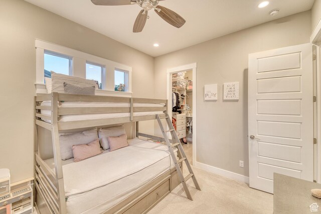 3207 W 2650 S, Hurricane, UT 84737 - bedroom featuring a walk in closet, light colored carpet, recessed lighting, baseboards, and a closet