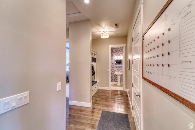 3207 W 2650 S, Hurricane, UT 84737 - corridor with wood finished floors, baseboards, and mail area