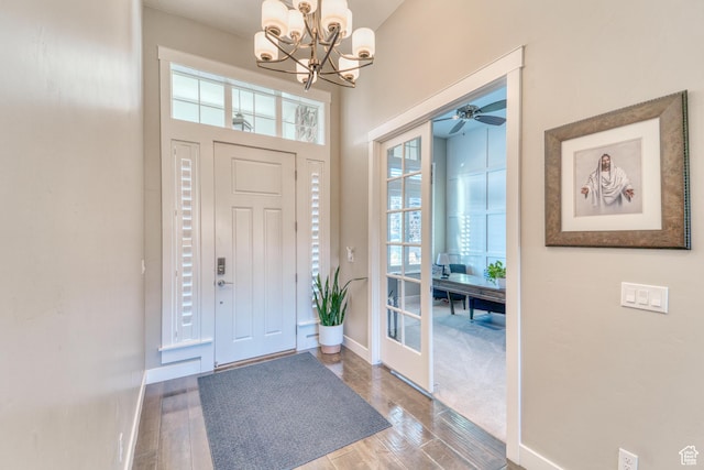 3207 W 2650 S, Hurricane, UT 84737 - entrance foyer featuring a chandelier, baseboards, wood finished floors, and ceiling fan