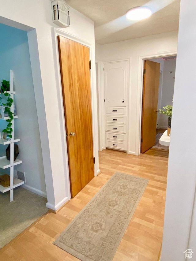 1321 Darling St, Ogden, UT 84403 - hallway featuring light wood-style flooring and baseboards