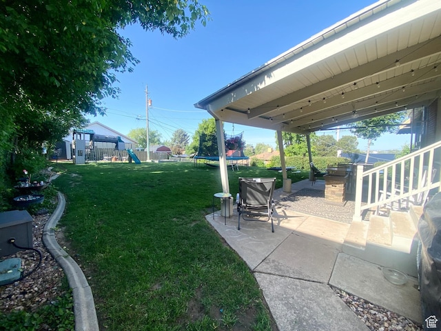 1321 Darling St, Ogden, UT 84403 - view of yard with a trampoline, a patio, and a playground