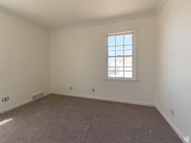 346 Columbia Dr, East Carbon, UT 84520 - empty room featuring crown molding, carpet, and baseboards