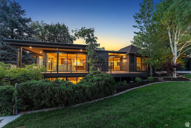 2655 E Hiawatha Cir, Salt Lake City, UT 84108 - rear view of property with a yard and a wooden deck