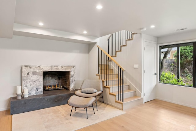 2655 E Hiawatha Cir, Salt Lake City, UT 84108 - living area with wood finished floors, stairway, recessed lighting, baseboards, and a fireplace
