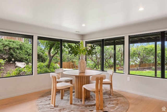 2655 E Hiawatha Cir, Salt Lake City, UT 84108 - sunroom / solarium with healthy amount of natural light, baseboards, wood finished floors, and recessed lighting