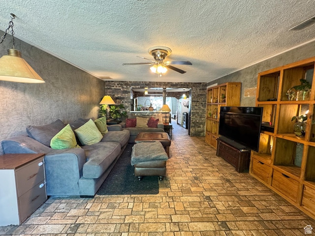 1204 S Redwood Dr, Salt Lake City, UT 84104 - living area with ceiling fan and a textured ceiling