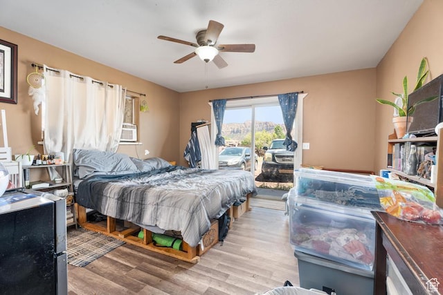 785 N Lauritzen St, Hildale, UT 84784 - bedroom with access to exterior, light wood-style floors, and a ceiling fan