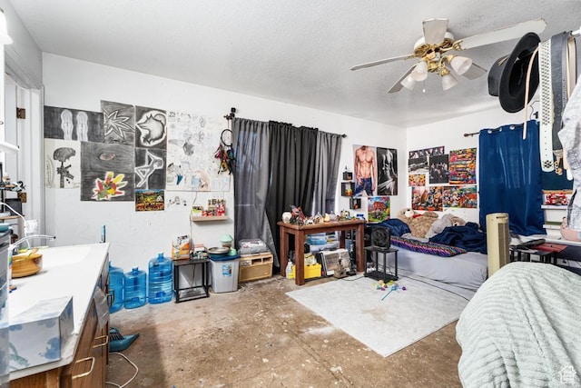 785 N Lauritzen St, Hildale, UT 84784 - bedroom with unfinished concrete floors, a sink, and ceiling fan