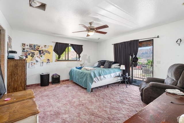 785 N Lauritzen St, Hildale, UT 84784 - carpeted bedroom featuring access to exterior and a ceiling fan