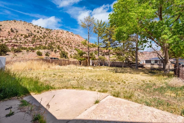 785 N Lauritzen St, Hildale, UT 84784 - view of yard featuring a mountain view and a patio area