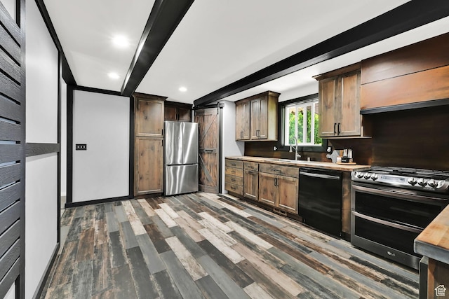 2195 W 4250 S, Roy, UT 84067 - kitchen featuring appliances with stainless steel finishes, a sink, wood finished floors, beamed ceiling, and light countertops