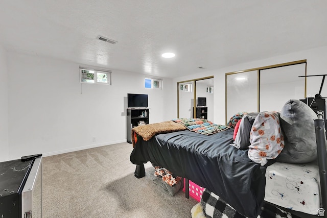 2195 W 4250 S, Roy, UT 84067 - carpeted bedroom featuring multiple closets and baseboards