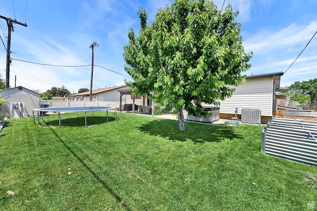 2195 W 4250 S, Roy, UT 84067 - view of yard with a trampoline and central air condition unit