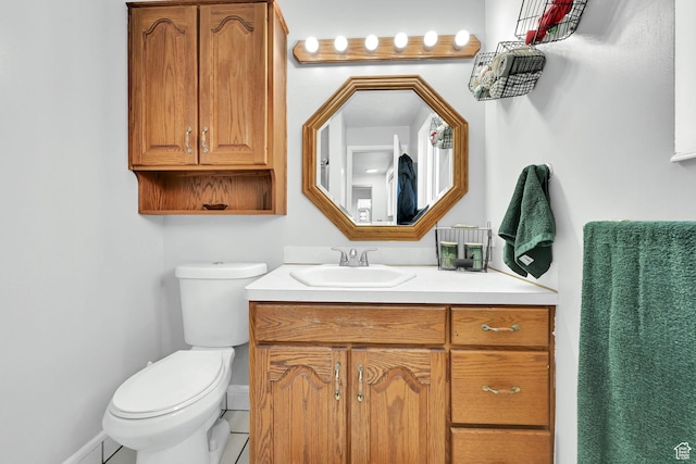 2195 W 4250 S, Roy, UT 84067 - bathroom with toilet, vanity, tile patterned floors, and baseboards