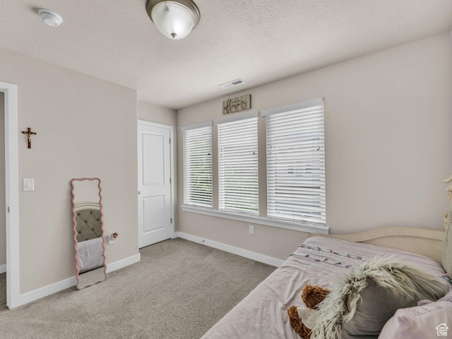 5636 W Lost Mine Ln, Herriman, UT 84096 - carpeted bedroom featuring baseboards and a textured ceiling