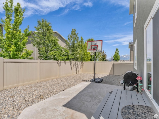 5636 W Lost Mine Ln, Herriman, UT 84096 - fenced backyard featuring a patio area