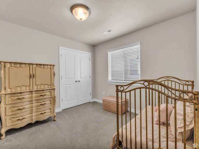 5636 W Lost Mine Ln, Herriman, UT 84096 - bedroom with light carpet, a closet, baseboards, and a textured ceiling