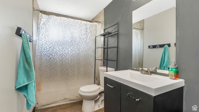 1951 W 7125 S, West Jordan, UT 84084 - full bathroom featuring toilet, vanity, and wood finished floors