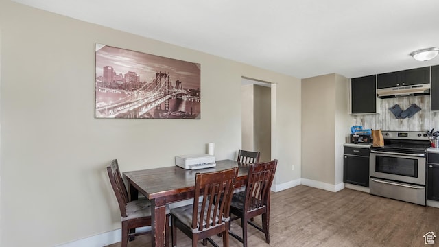 1951 W 7125 S, West Jordan, UT 84084 - dining area featuring light wood finished floors and baseboards