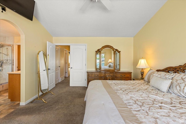6142 N Schooner Ln, Stansbury Park, UT 84074 - bedroom with arched walkways, carpet, baseboards, and ceiling fan