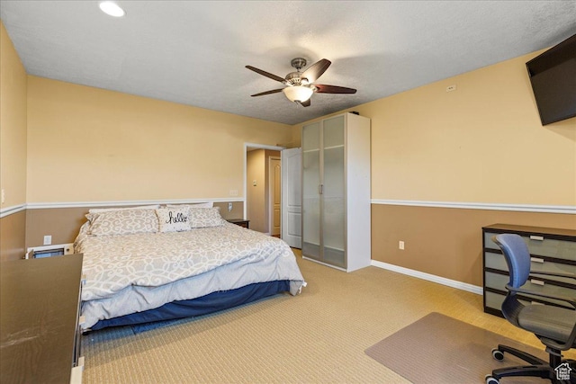 6142 N Schooner Ln, Stansbury Park, UT 84074 - bedroom featuring a desk, carpet floors, baseboards, ceiling fan, and a closet