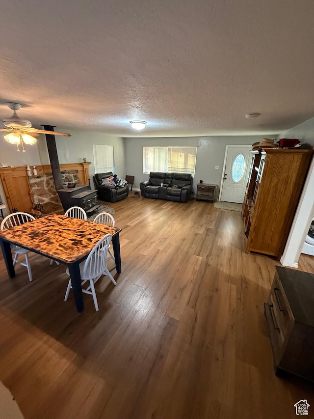 239 W Plum St, Grantsville, UT 84029 - dining area with plenty of natural light, light wood finished floors, ceiling fan, and a textured ceiling