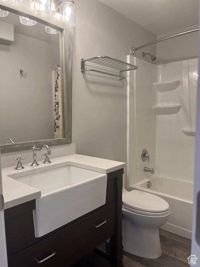 2027 W 2175 N, Lehi, UT 84043 - bathroom with vanity, toilet, wood finished floors, and shower / tub combo