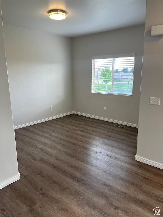 2027 W 2175 N, Lehi, UT 84043 - spare room with dark wood-type flooring and baseboards