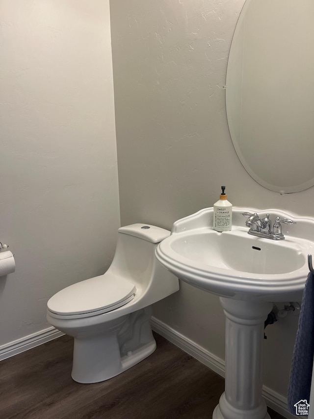 2027 W 2175 N, Lehi, UT 84043 - bathroom featuring toilet, wood finished floors, and baseboards
