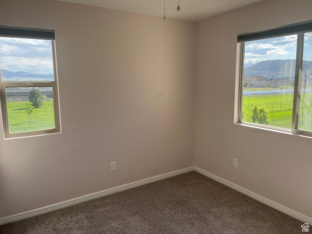 2027 W 2175 N, Lehi, UT 84043 - unfurnished room with a mountain view, carpet floors, and baseboards