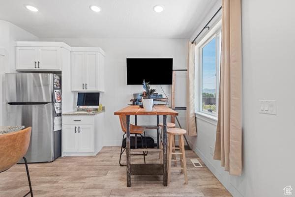 1024 E 1300 S Unit 31, Provo, UT 84606 - kitchen featuring freestanding refrigerator, white cabinetry, light wood finished floors, recessed lighting, and an office area