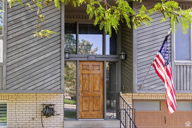 720 Freedom Cir N, Salt Lake, UT 84054 - doorway to property with brick siding