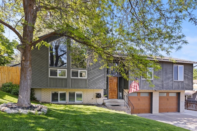 720 Freedom Cir N, Salt Lake, UT 84054 - view of front of home with brick siding, driveway, and a garage