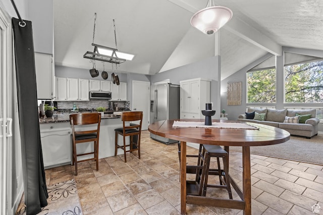 720 Freedom Cir N, Salt Lake, UT 84054 - dining area with light stone finish floors
