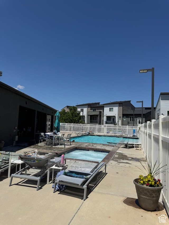5308 W Solafax Ln S, Herriman, UT 84096 - community pool featuring a patio area and a jacuzzi