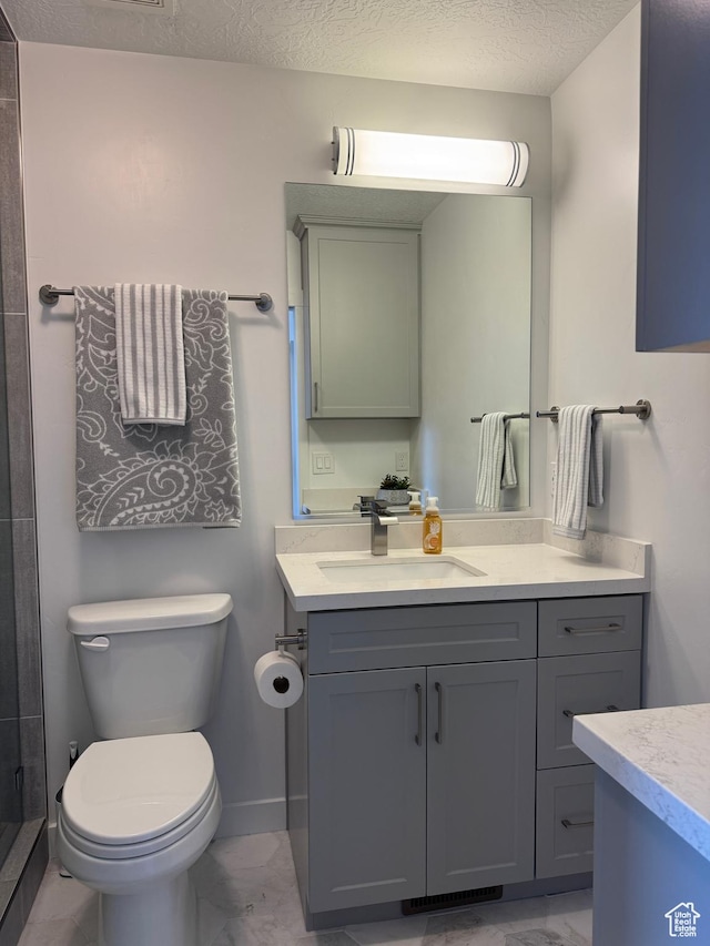 5308 W Solafax Ln S, Herriman, UT 84096 - bathroom with marble look tiles, vanity, a stall shower, and a textured ceiling
