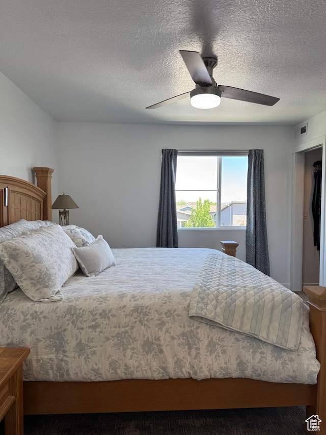 5308 W Solafax Ln S, Herriman, UT 84096 - bedroom with a textured ceiling and ceiling fan