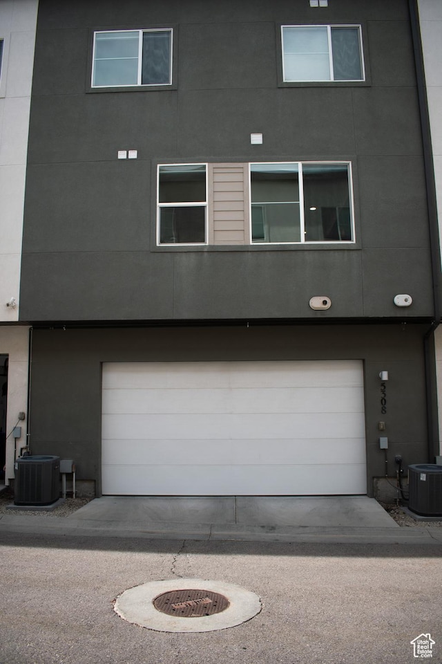 5308 W Solafax Ln S, Herriman, UT 84096 - view of front of house featuring a garage and stucco siding
