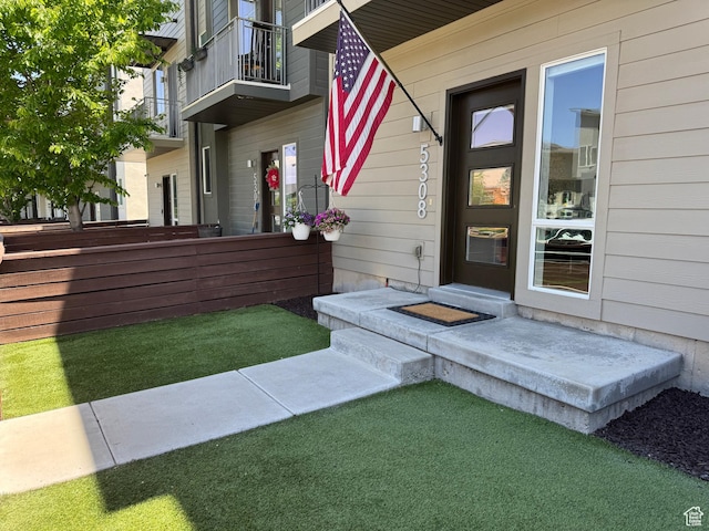 5308 W Solafax Ln S, Herriman, UT 84096 - view of exterior entry with a balcony