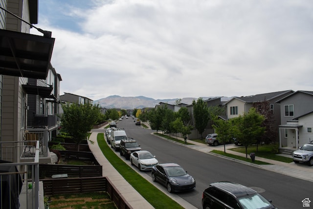 5308 W Solafax Ln S, Herriman, UT 84096 - view of asphalt road featuring sidewalks, a mountain view, curbs, and a residential view