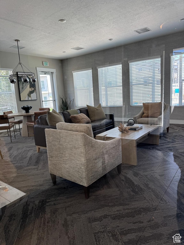 5308 W Solafax Ln S, Herriman, UT 84096 - living room with a textured ceiling and dark colored carpet