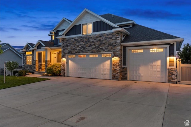 6688 W Buck Dr, Herriman, UT 84096 - craftsman-style house with stone siding, board and batten siding, and driveway