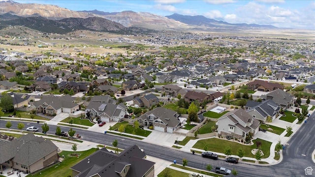 6688 W Buck Dr, Herriman, UT 84096 - aerial view of property's location with a mountainous background and nearby suburban area