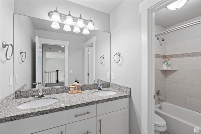6688 W Buck Dr, Herriman, UT 84096 - full bathroom with double vanity, shower / bathtub combination, and toilet