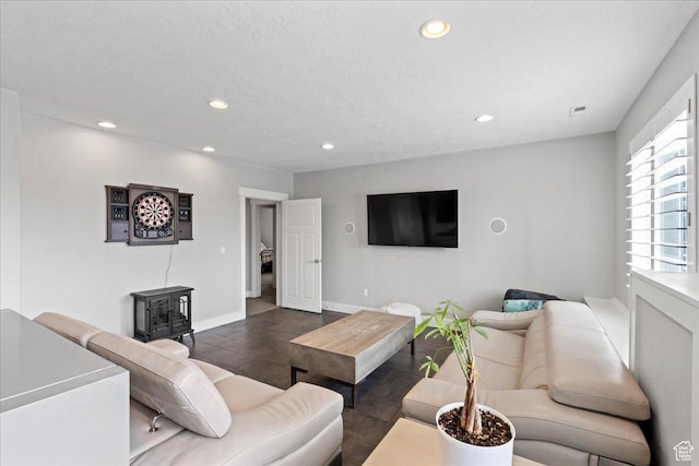 6688 W Buck Dr, Herriman, UT 84096 - living area featuring a wood stove, recessed lighting, and baseboards