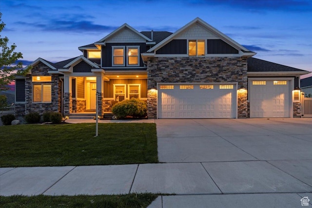 6688 W Buck Dr, Herriman, UT 84096 - craftsman inspired home with stone siding, board and batten siding, a yard, and concrete driveway