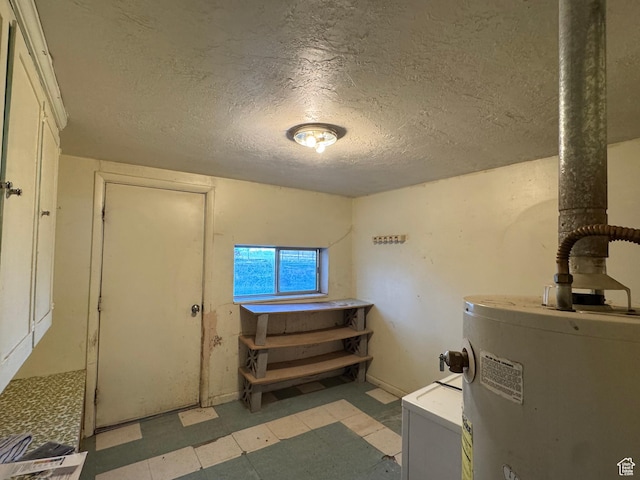 109 W 300 S, Holden, UT 84636 - interior space with water heater, light floors, and a textured ceiling