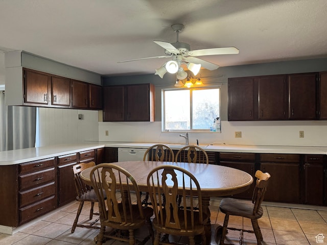 109 W 300 S, Holden, UT 84636 - kitchen featuring ceiling fan, dark brown cabinetry, light tile patterned floors, and light countertops