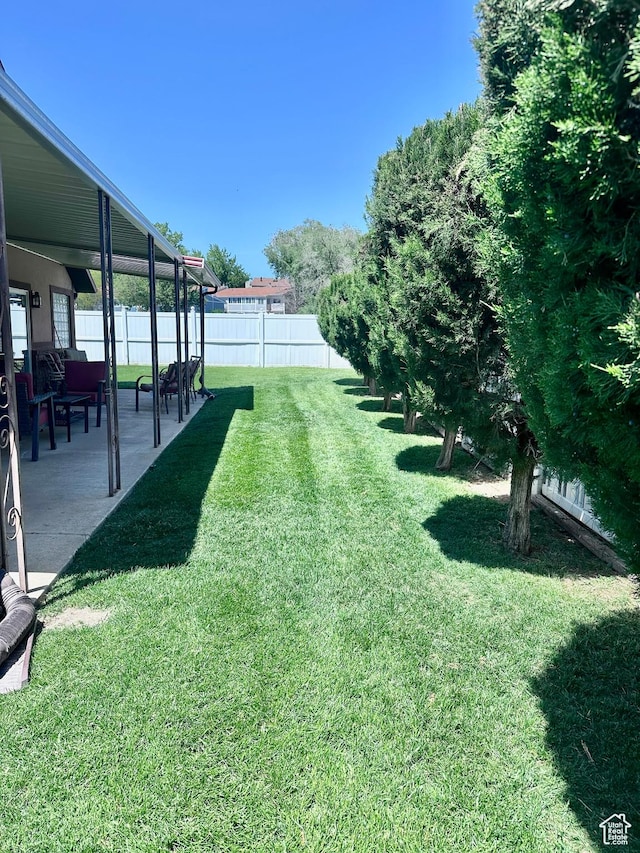 1660 E 900 S Unit 19, Clearfield, UT 84015 - view of yard featuring a patio area